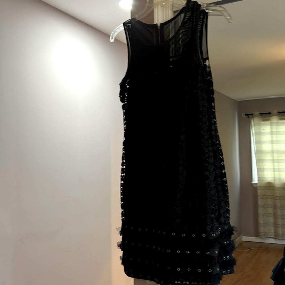 Beautiful little black dress with lots of detail